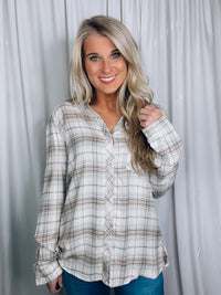 Top features a cream base, mint plaid detail, button down detail, long sleeve and runs true to size! 