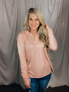 Top features a solid blush color, long sleeves, collar detail, soft material and runs true to size! 