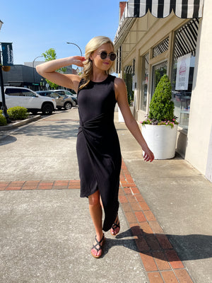 Dress features a solid base color, midi length, soft ribbed material, sleeveless detail, round neck line, wrap detail and runs true to size!-black