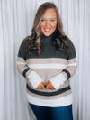 Sweater features a color block striped detail, long sleeve, crew neck line, comfy material and runs true to size! -brown