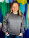 Graphic features a solid base color, embroidering lettering, long sleeves, oversized/ relax fit and runs true to size! 
