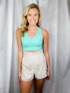 Shorts feature a elastic high waist band, under wear lining and runs true to size! -bone