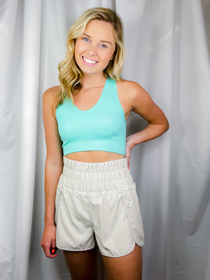 Shorts feature a elastic high waist band, under wear lining and runs true to size! -bone