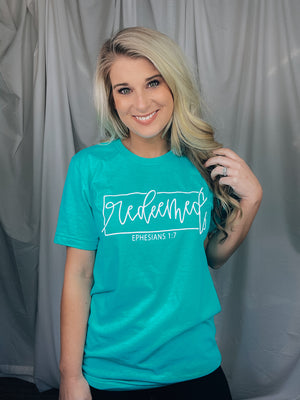Graphic tee features an aqua mint colored tee, white design, short sleeve, unisex fit, legging approval and runs true to size! 