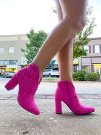 Booties feature a solid colored base, full rhinestone detailing, side zip- up detail, 3.5 heel, and runs true to size!-pink