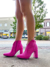 Booties feature a solid colored base, full rhinestone detailing, side zip- up detail, 3.5 heel, and runs true to size!-pink