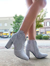Booties feature a solid colored base, full rhinestone detailing, side zip- up detail, 3.5 heel, and runs true to size!-silver
