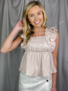 Top features a solid base color, square neck line, ruffle straps, hip length and runs true to size! 
