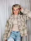 Shacket features a grey plaid print, long sleeves, button up detail, relaxed fit and runs true to size!   - Plaid casual button down jacket - Side slit - Long sleeve - Pocket patched