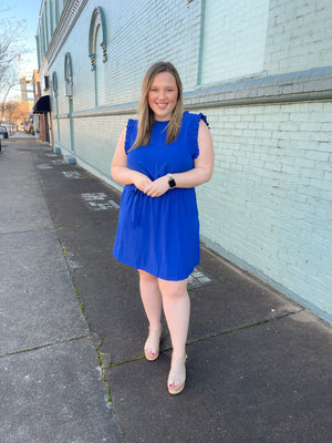 Dress features a stunning royal blue color, ruffle hem line detail, elastic waist, tie belt addition, functional pockets and runs true to size! 