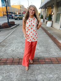 Top features an ivory base, mint/coral floral print design, ruffle high neck line, ruffle cap sleeves, light weight material and runs true to size! 