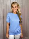 Top features a solid base color, crew neck line, short sleeves, and runs true to size! -periwinkle