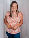 Top features a lightweight material, ruffle neck line, pastel floral print, ruffle sleeve detail and runs true to size! 