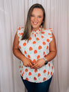 Top features an ivory base, mint/coral floral print design, ruffle high neck line, ruffle cap sleeves, light weight material and runs true to size! 