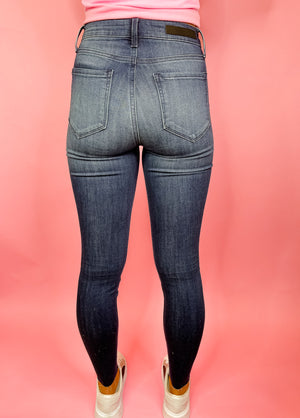 Bottoms feature a dark denim wash, skinny leg fit, frayed bottoms detailing, stretchy material and runs true to size! 