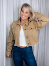 Jacket features a dark camel color, long sleeves, open front detail button up closure, pockets and runs true to size! 
