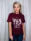 Graphic features a solid base color, short sleeves, dancing skeleton design unisex fit and runs true to size! -maroon 