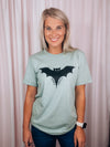 Graphic features a solid base colored tee, short sleeves, unisex fit, distressed black design and runs true to size!-sage