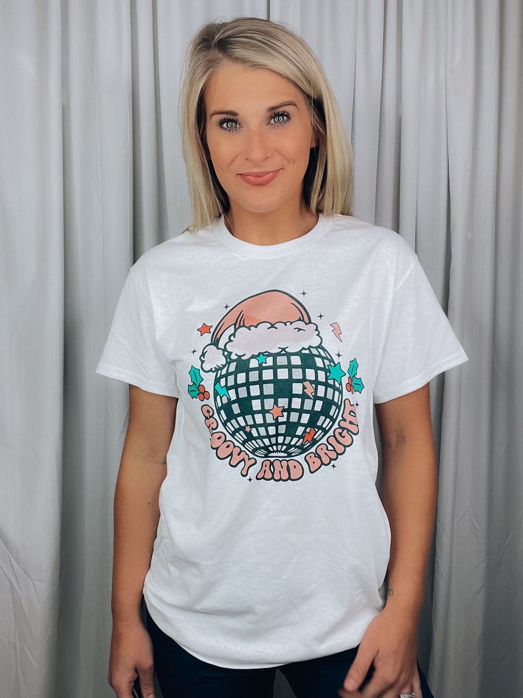 Graphic features a heathered tee, short sleeves, unisex fit, Christmas disco ball design, unisex fit and runs true to size! 