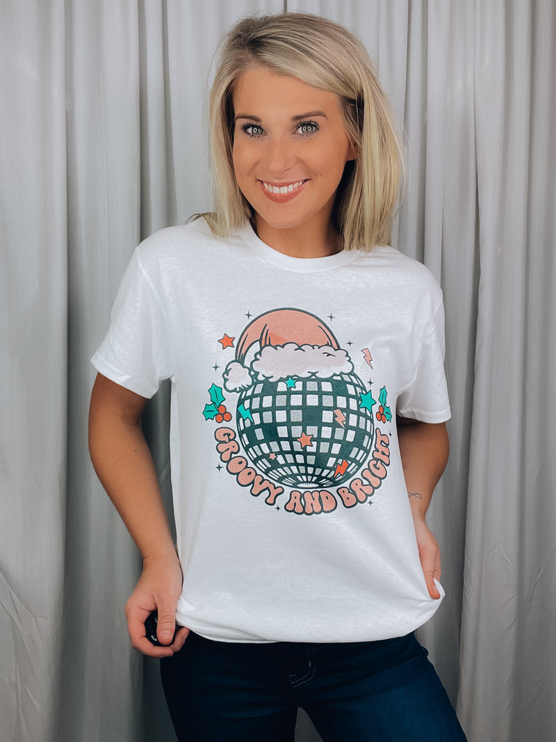 Graphic features a heathered tee, short sleeves, unisex fit, Christmas disco ball design, unisex fit and runs true to size! 