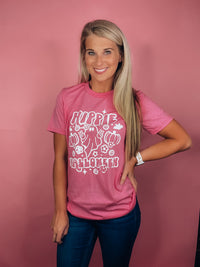 Graphic features a solid base colored tee, bubble white design, short sleeves, unisex fit and runs true to size! -pink