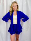 Blazer features a solid base color, open front, long sleeves and runs true to size! Materials: 100% Polyester-royal