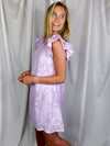 Dress features a simple lavender base, ruffle short sleeves, underlining detail and runs true to size!   *100% Polyester 