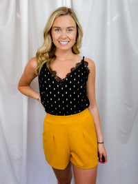 Bottoms feature a solid base color, light weight material, pockets, thick high waist band, elastic back band and runs true to size! Materials: 100% Polyester -mustard