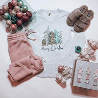 Graphic tee features a heather grey shirt, long sleeves, V-neck line, unisex fit, tree design and runs true to size! Printed on Bella Canvas.   Merry Christmas with a variety of Christmas Trees. 