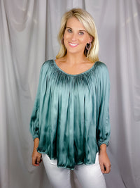 Top features a solid base color, long sleeves, thin material, on/off the shoulder detail, elastic neck/ shoulder detail and runs true to size!-sea foam