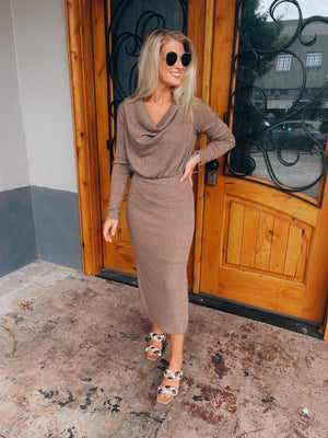 Dress features a beautiful deep mocha color, soft ribbed material, side slit, cowl neck line, long sleeves, fitted fit and runs true to size! 