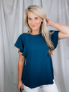 Top features a solid base color, stretchy material, short ruffle sleeves, round neck line and runs true to size!-navy