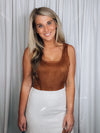 Bodysuit features a solid base color, suede material, sleeveless material, square neck line and runs true to size!-cognac
