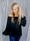 Top features a solid base color, long sleeves, thin material, on/off the shoulder detail, elastic neck/ shoulder detail and runs true to size!-black