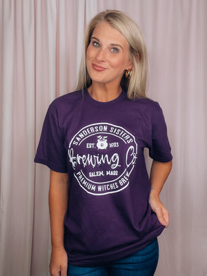Graphic features a dark base colored tee, short sleeves, round neck line, unisex fit, white ink design and runs true to size! -purple