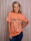 Graphic features a solid base colored tee, short sleeves, black design, unisex fit and runs true to size! -peach