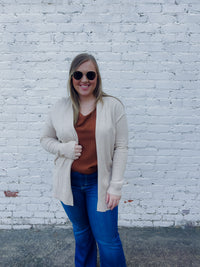 Cardigans feature a solid base color, soft material ,long sleeves, open front detail and runs true to size! -oatmeal