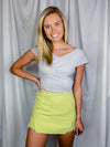 Skort features a solid base color, cut out detailing, airy feel and runs true to size!-green