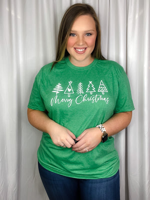 Graphic features a solid base color, short sleeves, white Merry Christmas with trees design, unisex fit and runs true to size!-green