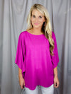 Top features a solid base color, kimono sleeves, round neck line, light weight material and runs true to size! 