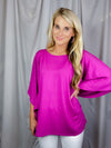 Top features a solid base color, kimono sleeves, round neck line, light weight material and runs true to size! 