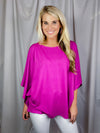 Top features a solid base color, kimono sleeves, round neck line, light weight material and runs true to size! 