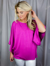 Top features a solid base color, kimono sleeves, round neck line, light weight material and runs true to size! 