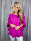 Top features a solid base color, kimono sleeves, round neck line, light weight material and runs true to size! 