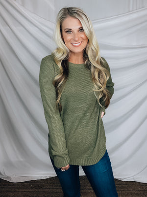 Sweater features a ribbed detailing, basic neck line, long sleeve, soft material and runs true to size!-OLIVE
