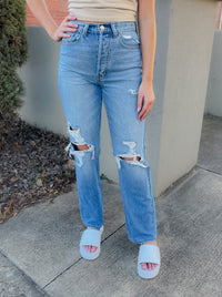 Our Blaze The Trail Dad Jeans offer a light denim wash for a modern look. Tailored for a dad jean fit, these jeans have a high waisted detail and distressed detailing for a vintage touch. Combining comfort with style, these jeans are perfect for any occasion.