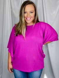 Top features a solid base color, kimono sleeves, round neck line, light weight material and runs true to size! 