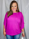 Top features a solid base color, kimono sleeves, round neck line, light weight material and runs true to size! 
