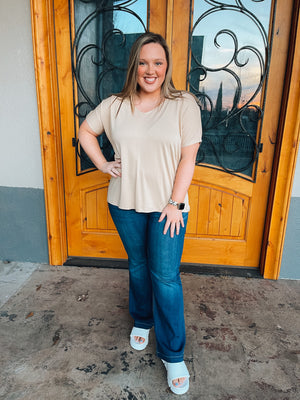 Discover the perfect combination of comfort and style with the Carefree Nights Top. Featuring kimono sleeves, a V-neck line, and a relaxed fit, this top is crafted with lightweight fabric and a neutral taupe color. Enjoy effortless breathability and an unparalleled level of coziness.
