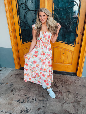 This Piece of Heaven Midi Dress is a stunning example of an everyday wardrobe must-have. Featuring a stunning floral print, midi length, ruffled hem and fully lined design, it has all the features needed for a timeless, chic look. With its square neckline, this dress will have you looking and feeling like you stepped out straight from the runway.